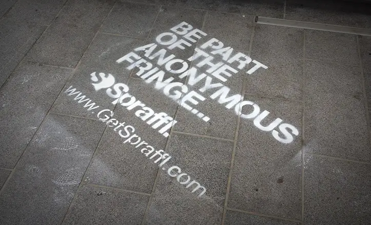 Chalk street graffiti advertising in Edinburgh